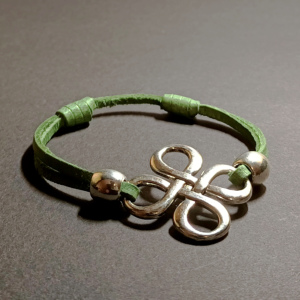 damska skórzana bransoletka damska zielona z dużym metalowym elementem