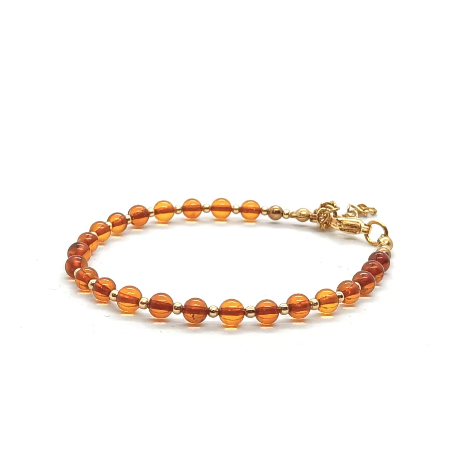 Bransoletka Bursztyn koniakowy, stal chirurgiczna pozłacana 15,5-19,5cm KAM1259